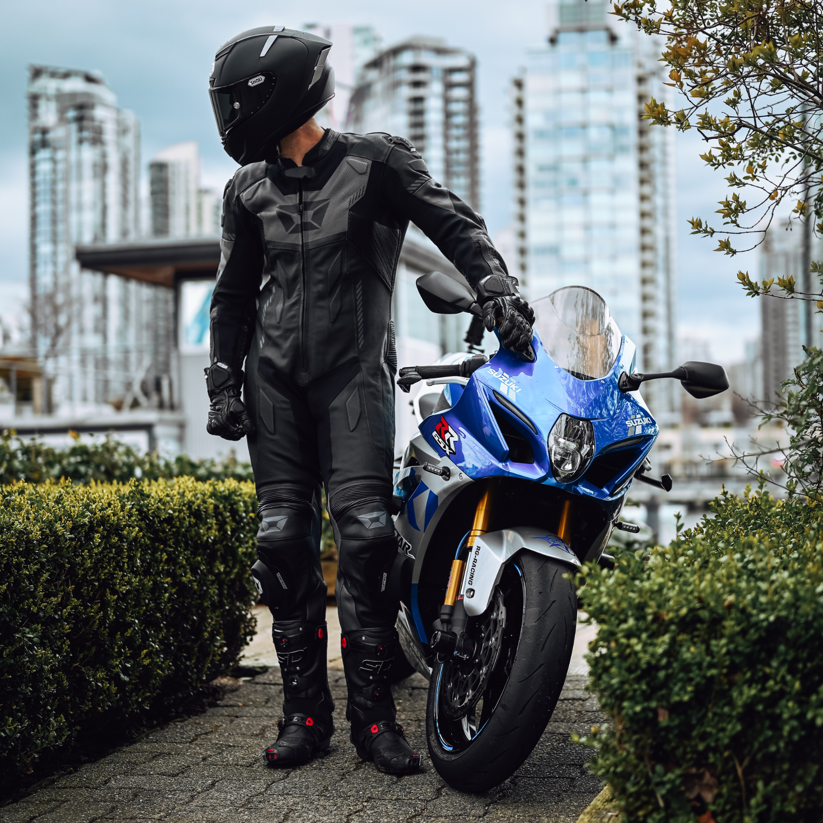 black motorcycle helmet and suit SHOEI - X-Fifteen
